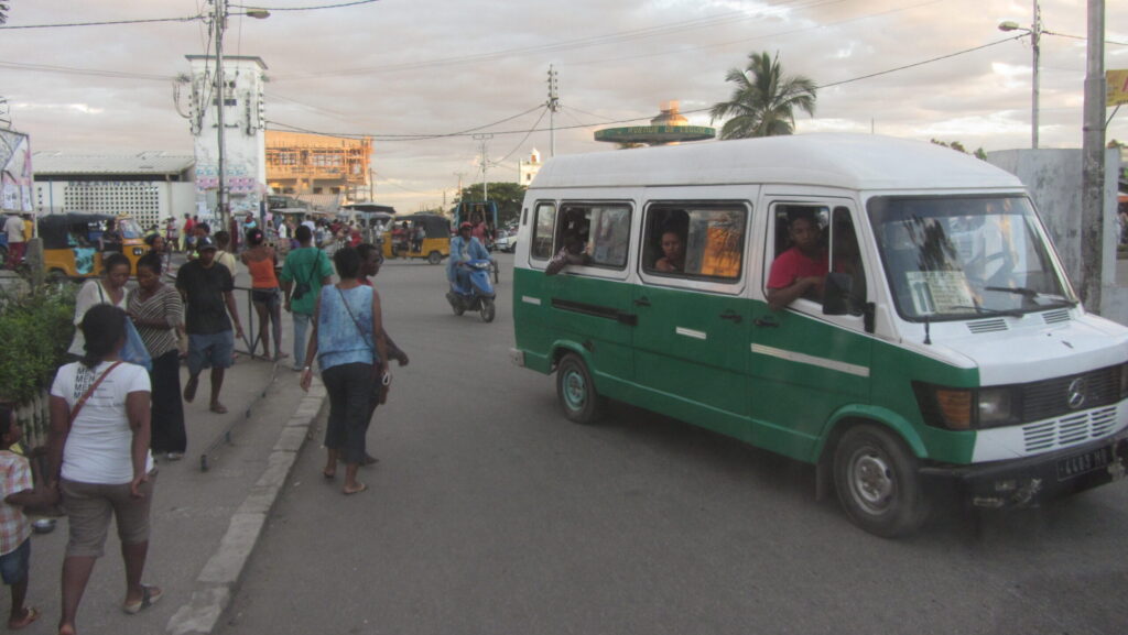 A local bus on a busy street in Madagascar