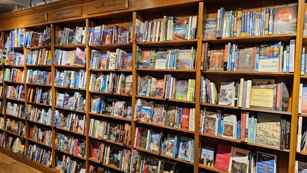 Bookshelves filled with travel books