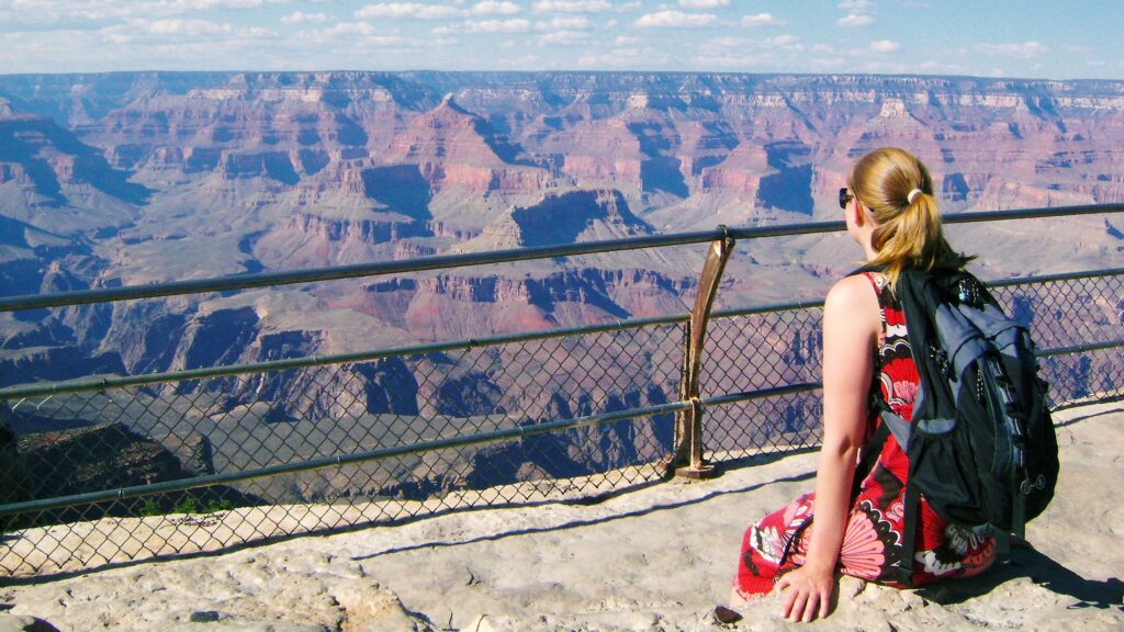 Woman looking over the Grand Canyon