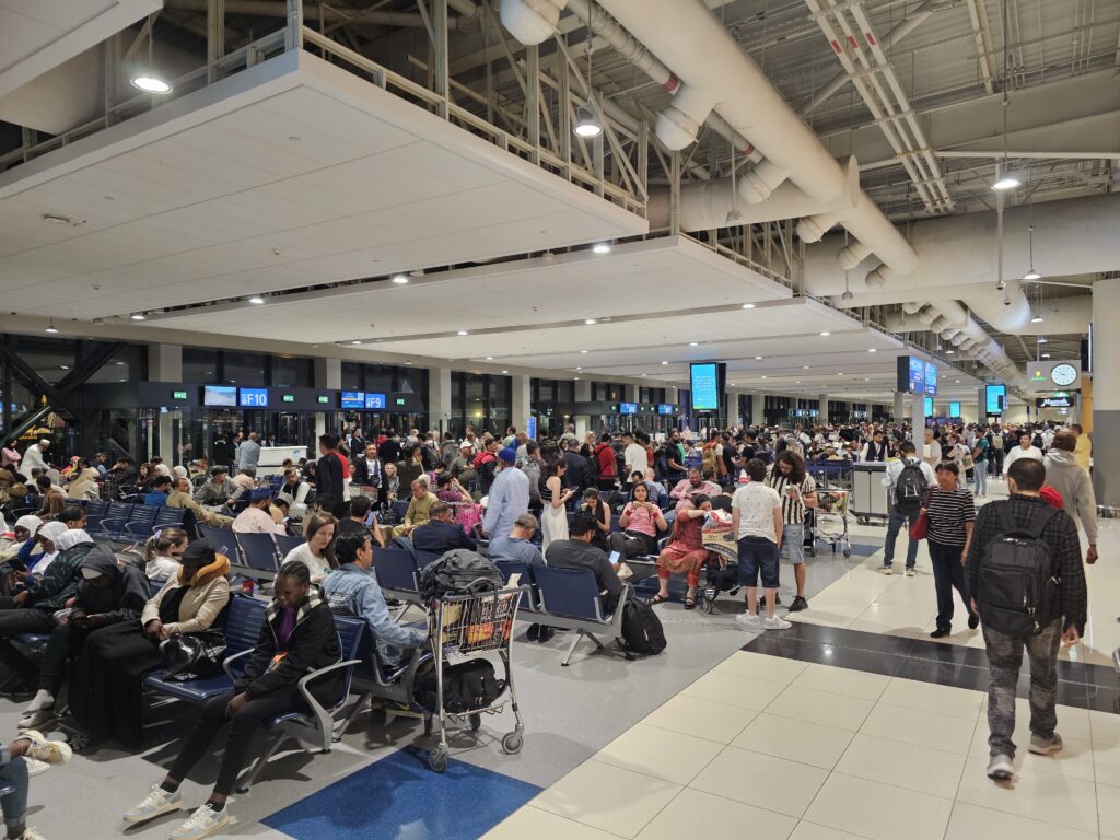 A very crowded departures gate at Dubai airport