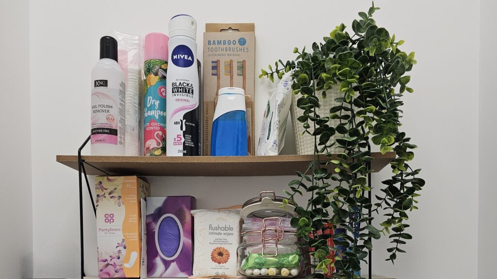 Shelf with a selection of female toiletries