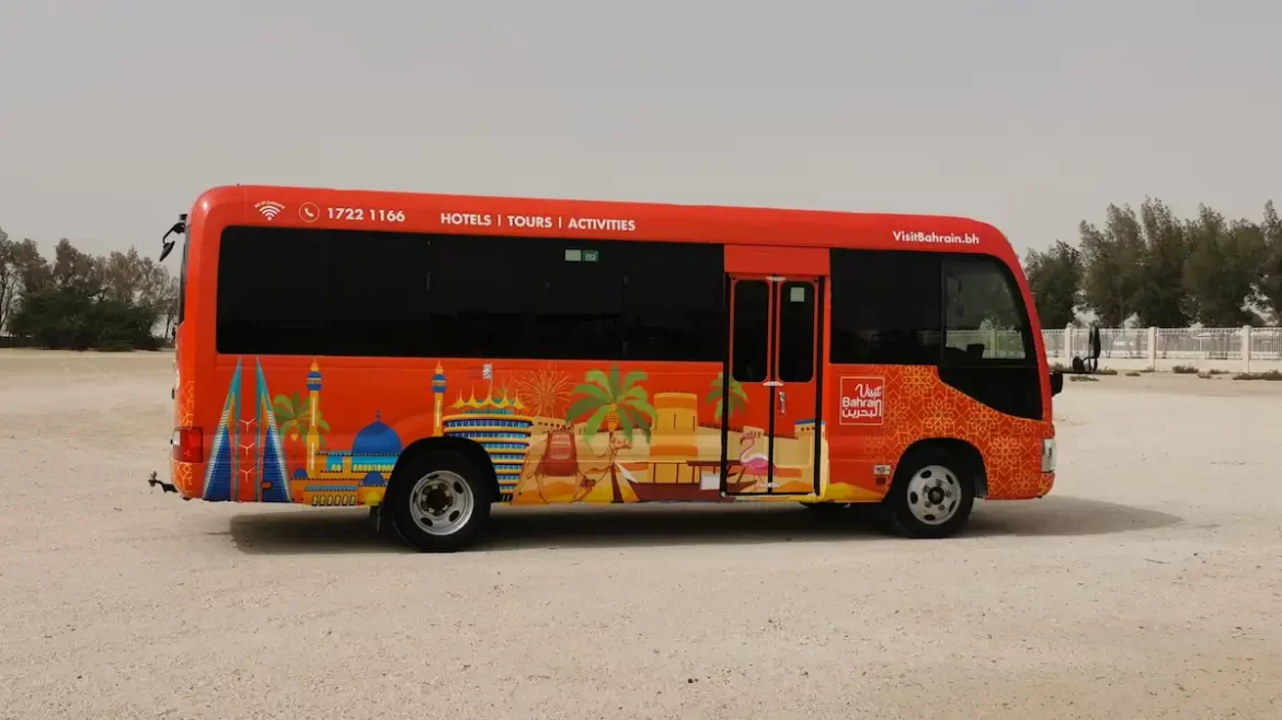 A red bus in a desert