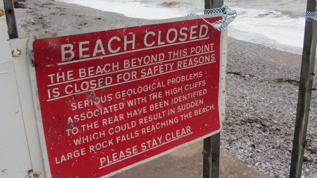Beach closed sign