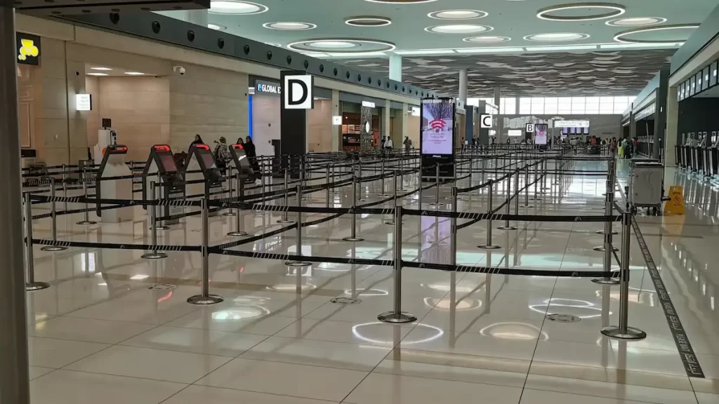 An empty check-in area at an airport