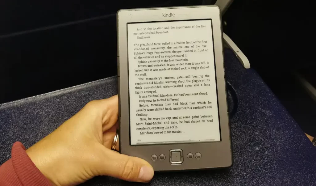 A kindle being held