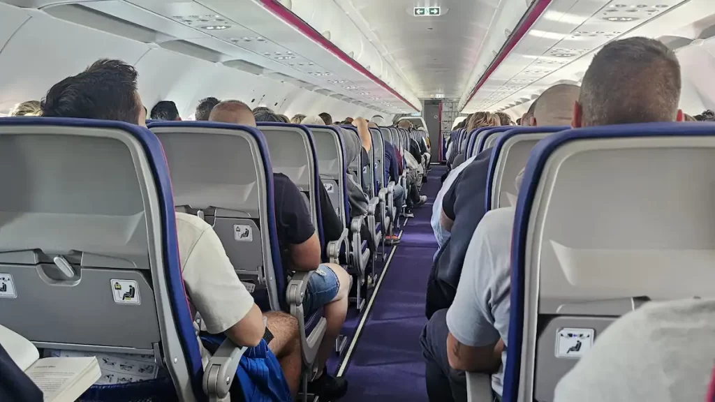 Looking down the centre of an airplane