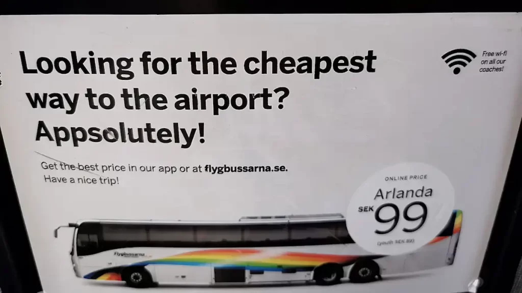A sign advertising an airport shuttle bus