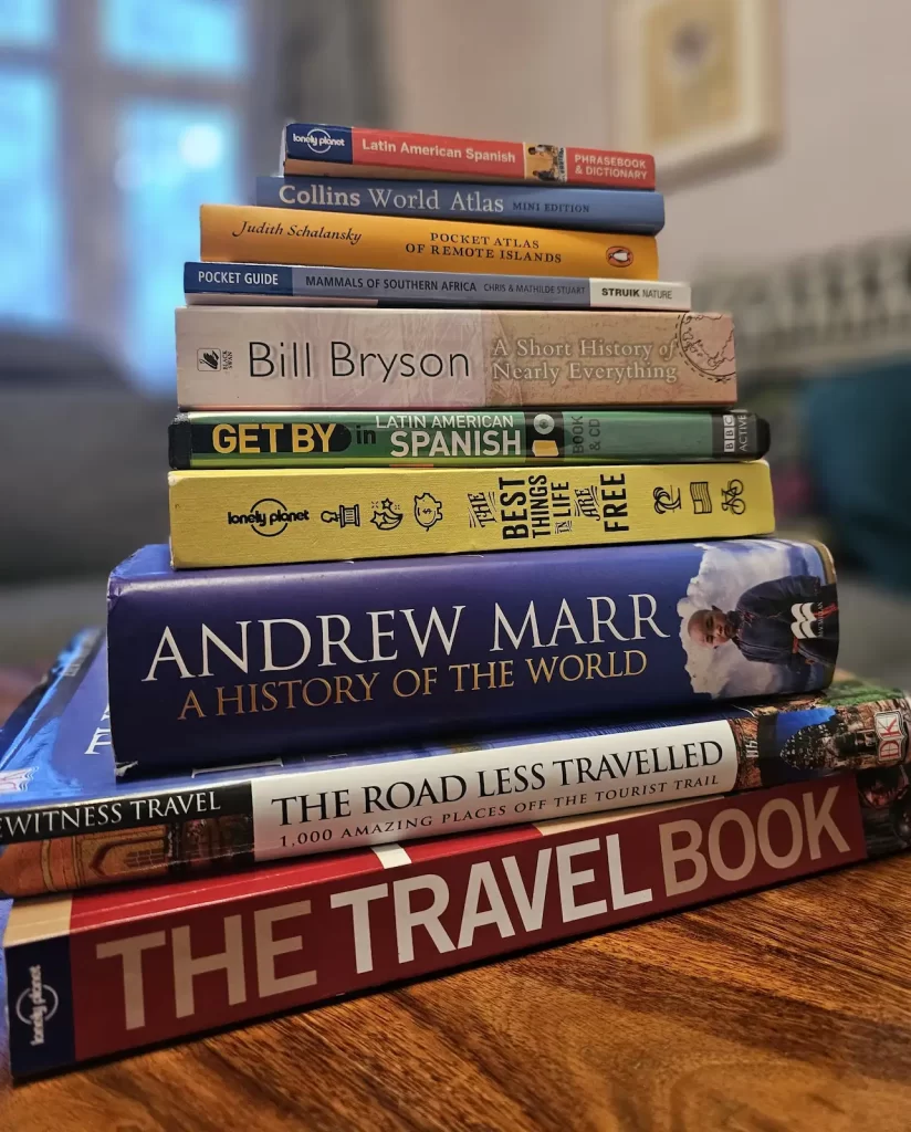 A stack of travel guidebooks