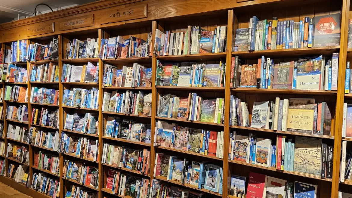 Bookshelves filled with travel books