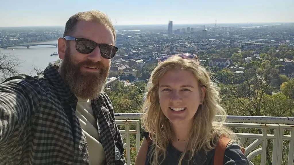 Couple in front of a view of the Budapest skyline