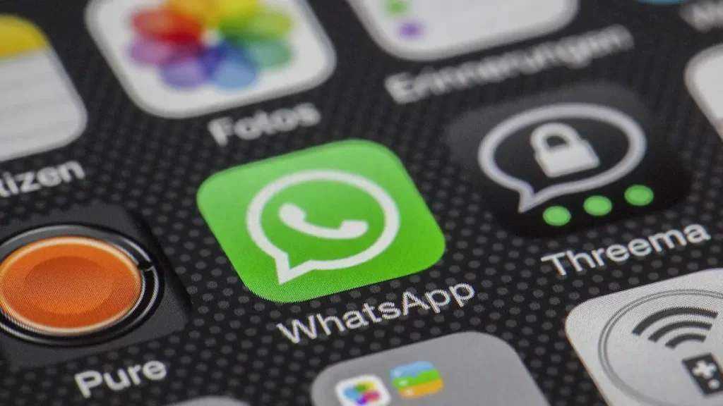 A phone screen showing the WhatsApp icon