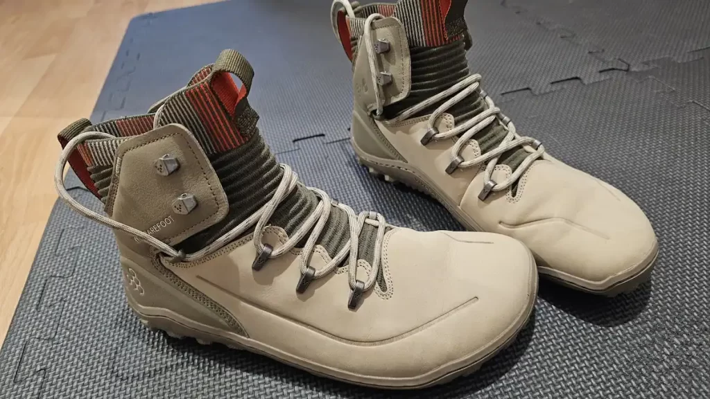 A pair of light tan walking boots